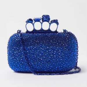 Alexander McQueen Skull Four Ring crystal embellished clutch bag